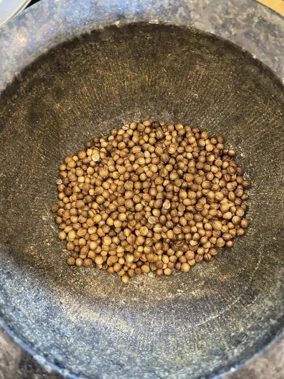 Coriander seeds before grinding