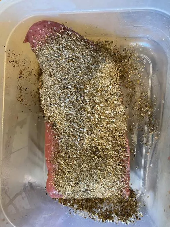 Seasoned beef photographed during preparation